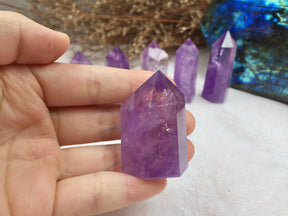 Amethyst Tower-point as a gift for yourself and friends, it comes in two sizes to choose from